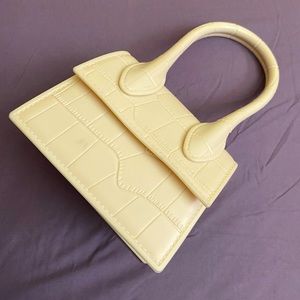 White small hand purse